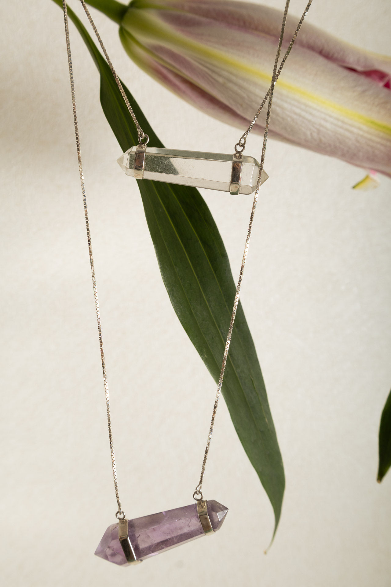 ESCAPULÁRIO PÊNDULOS BITERMINADOS CRISTAL E AMETISTA